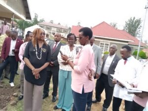 Project focal person Rotarian Justin Rwakakooko PHF addressing the DG at Ntungamo Health centre IV