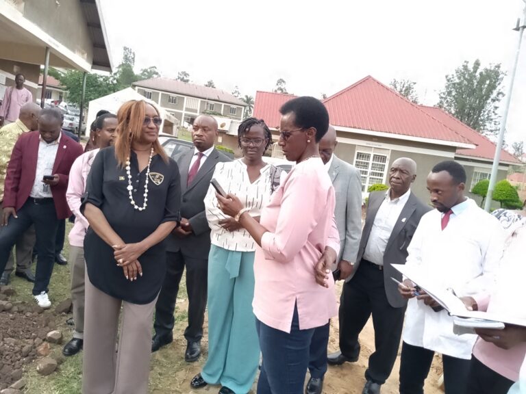 Project focal person Rotarian Justin Rwakakooko PHF addressing the DG at Ntungamo Health centre IV